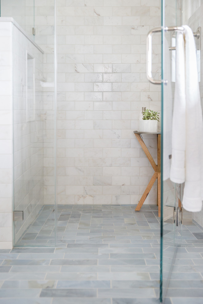 Inspiration for a mid-sized arts and crafts bathroom in San Francisco with shaker cabinets, white cabinets, a curbless shower, a two-piece toilet, blue tile, stone tile, blue walls, marble floors, an undermount sink and engineered quartz benchtops.