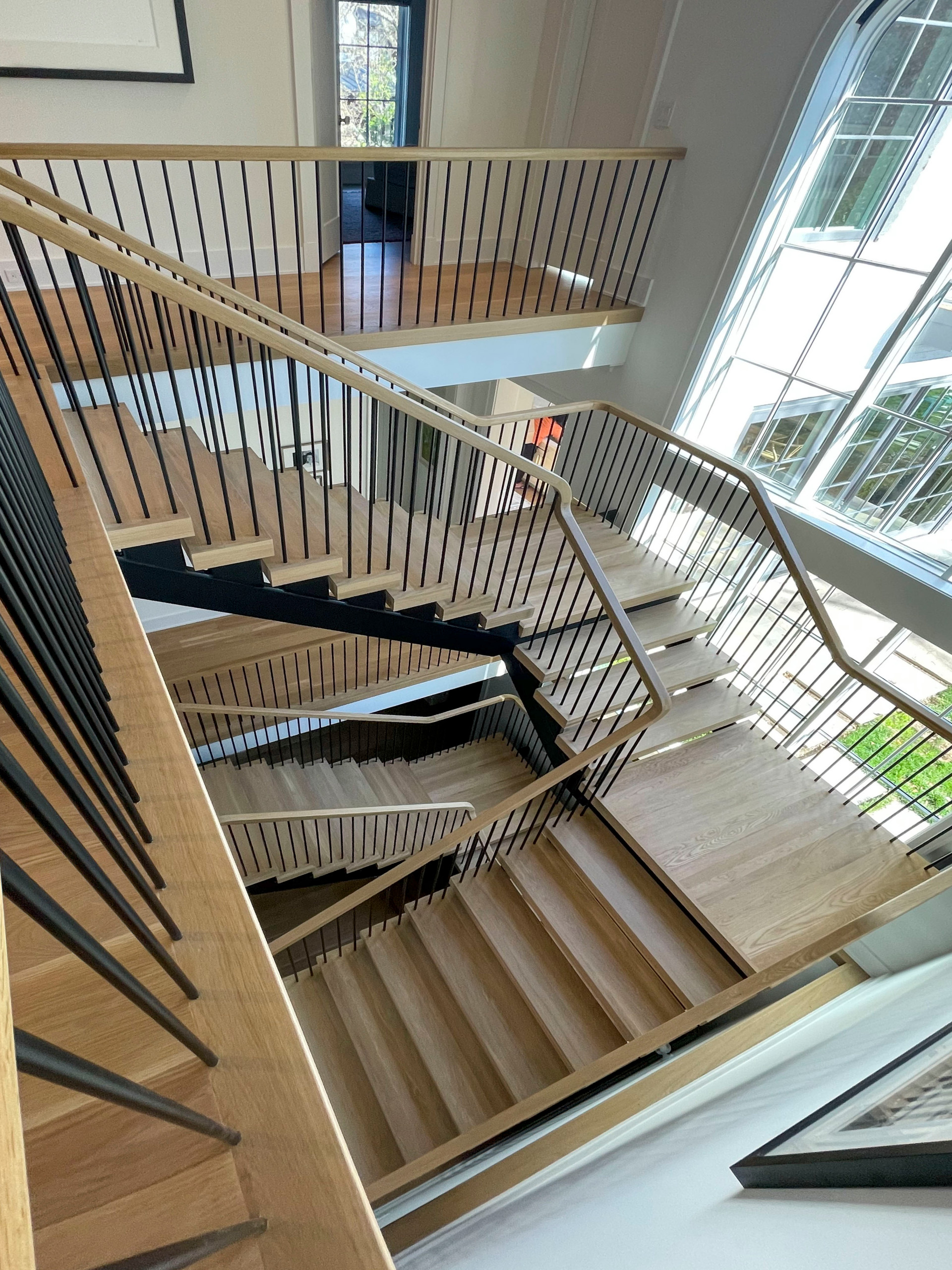 96_Dramatic cantilevered no-riser staircase, Bethesda, MD 20814