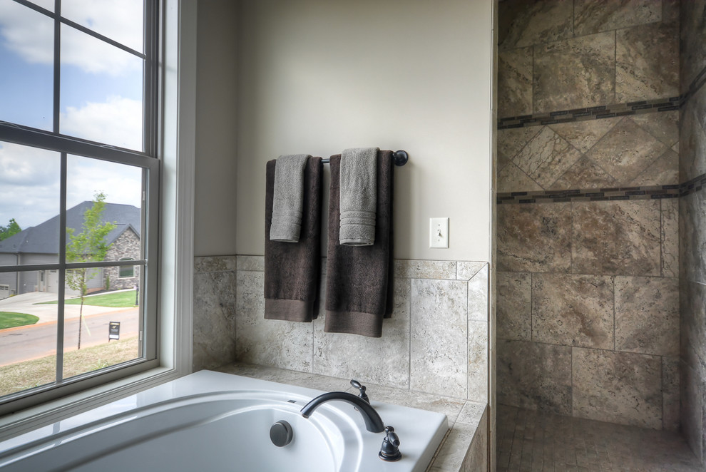 Inspiration for a large arts and crafts master bathroom in Other with a drop-in tub, an alcove shower, gray tile, ceramic tile, beige walls and porcelain floors.