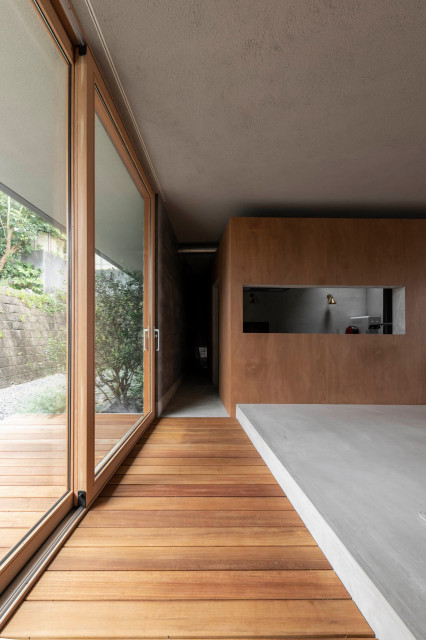 夕陽と共に暮らす家 giapponese-moderno-ingresso