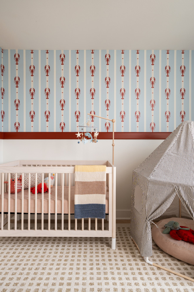 Nursery - mediterranean boy light wood floor, wallpaper and beige floor nursery idea in Los Angeles with multicolored walls