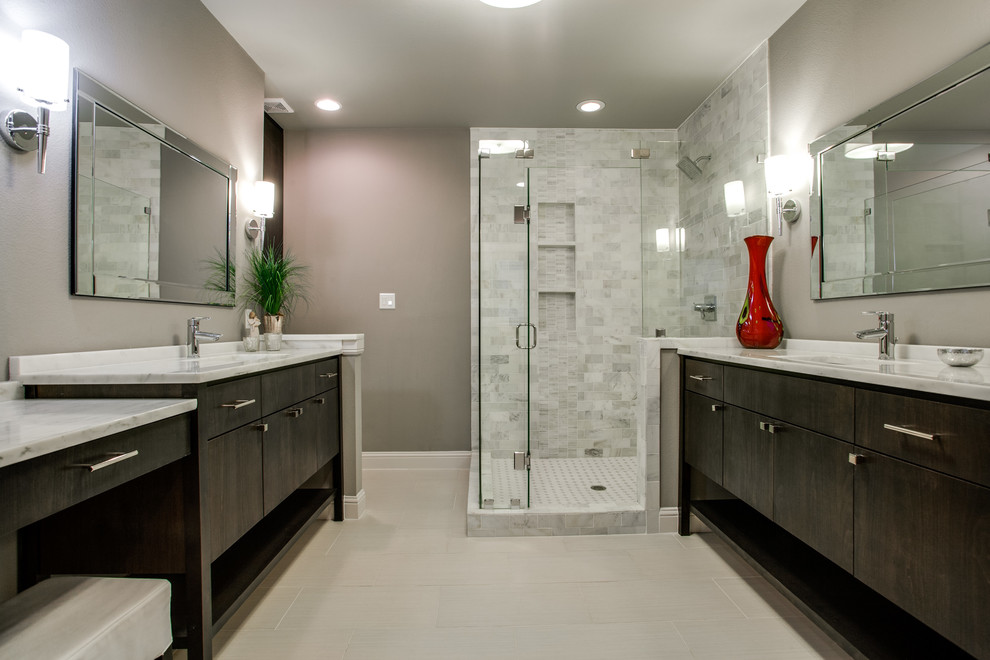 This is an example of a contemporary bathroom in Dallas with flat-panel cabinets, dark wood cabinets, white tile and a corner shower.