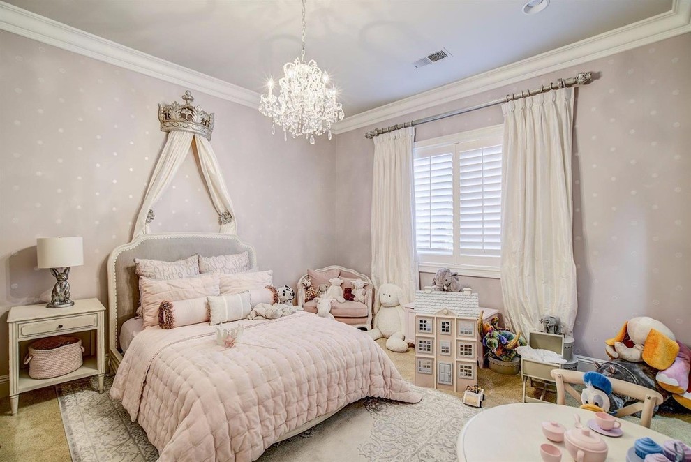 Photo of a large transitional kids' bedroom for kids 4-10 years old and girls in Sacramento with pink walls, carpet and beige floor.