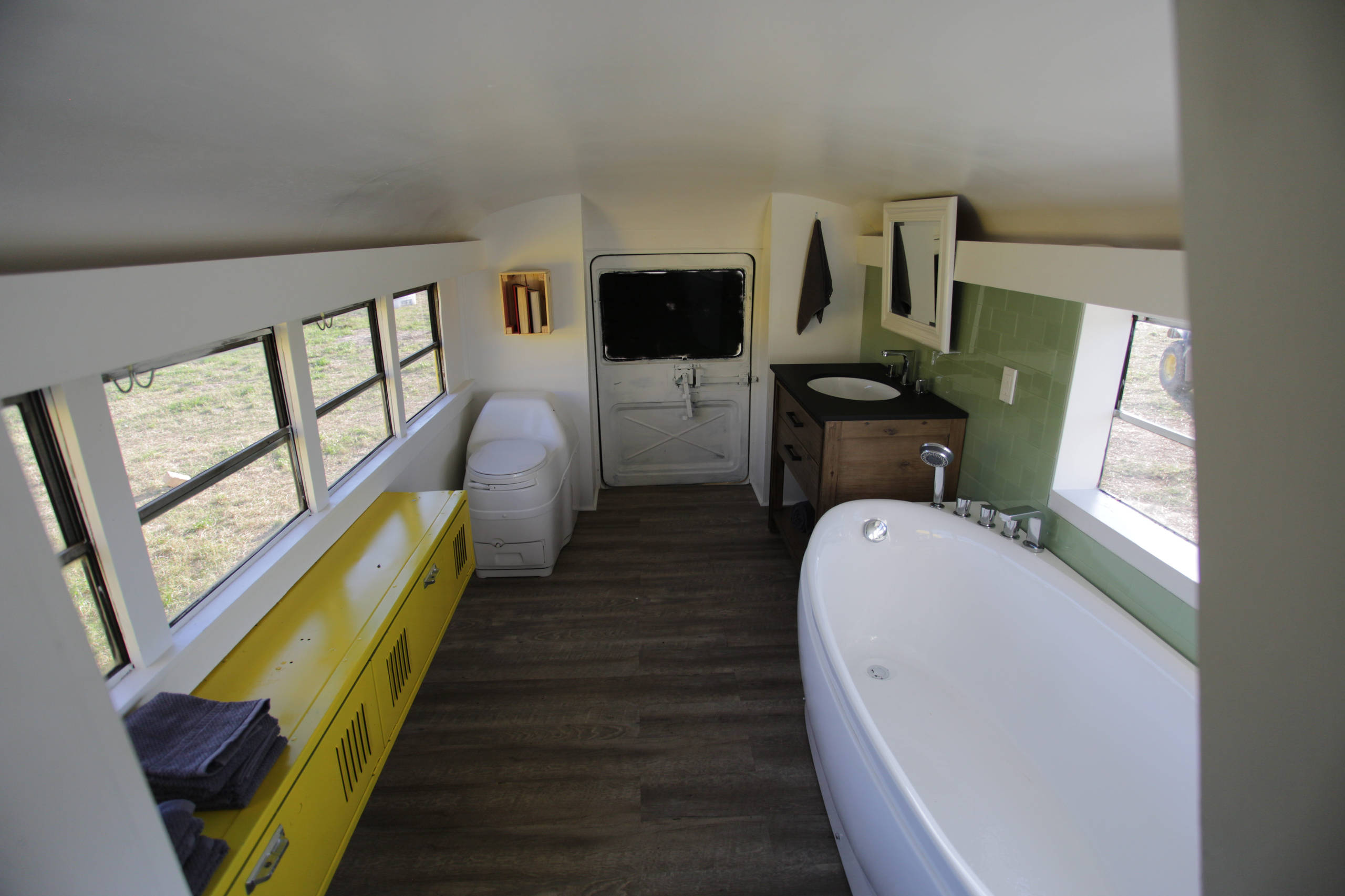Vintage busses merge into a new tiny home
