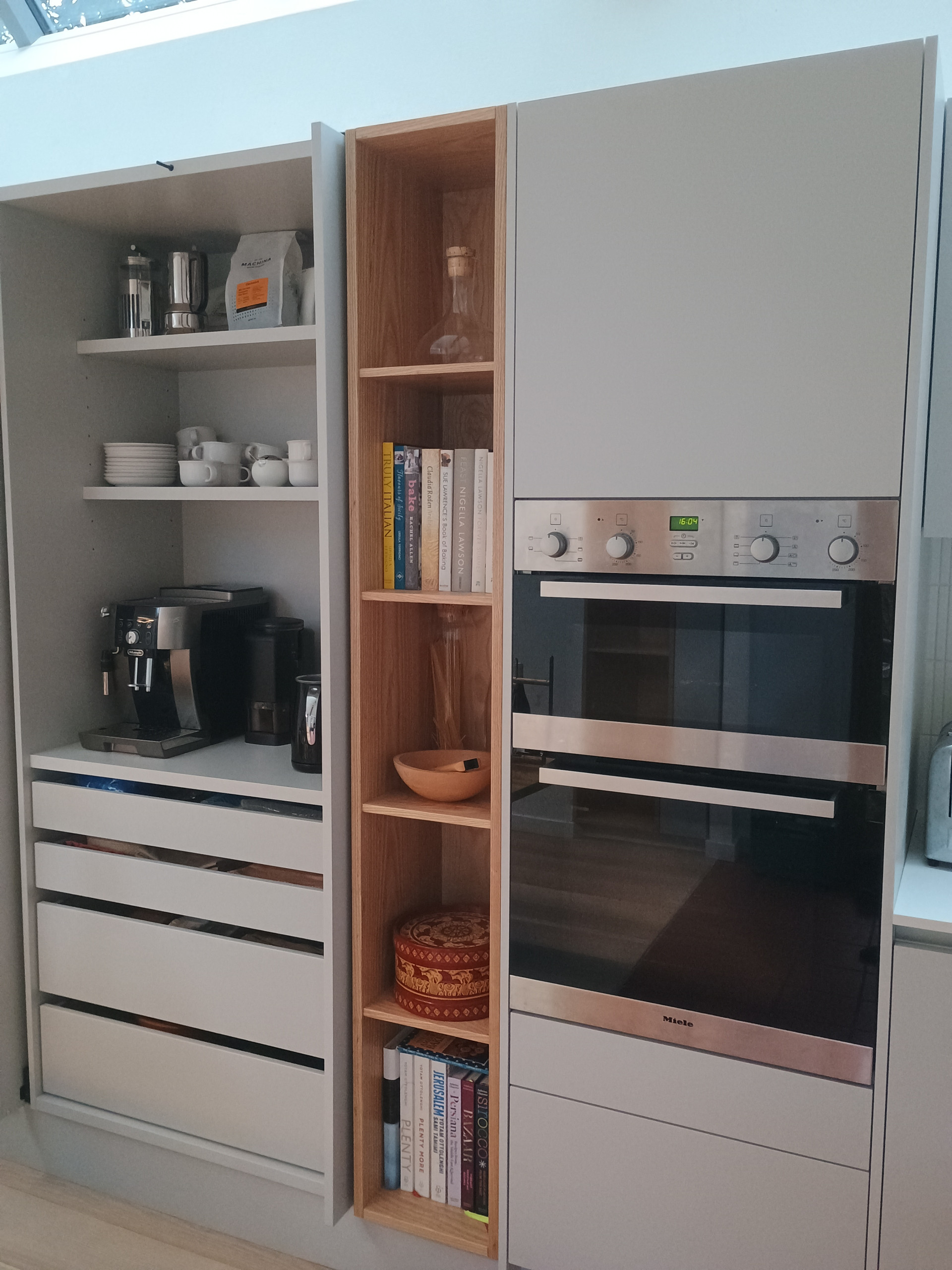Additional solid ask kitchen unit to store ornaments and cook books