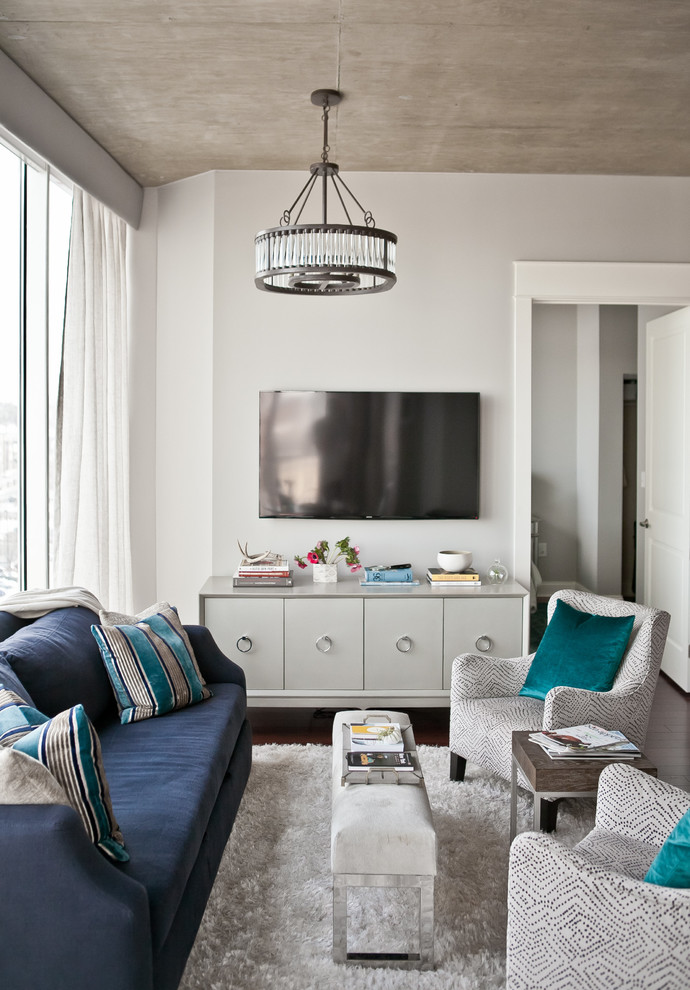 Design ideas for a transitional living room in Nashville with grey walls, no fireplace and a wall-mounted tv.
