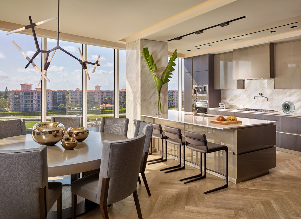 Inspiration for a contemporary l-shaped open plan kitchen in Miami with an undermount sink, flat-panel cabinets, brown cabinets, beige splashback, light hardwood floors, with island and beige floor.