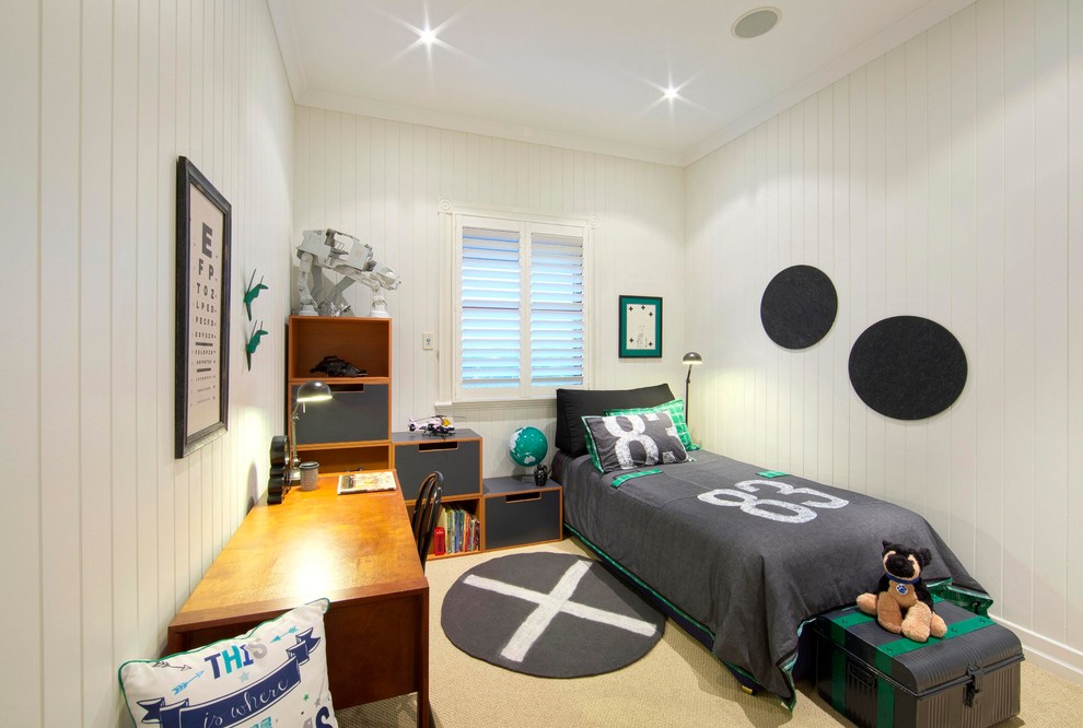 This is an example of a small contemporary kids' bedroom for kids 4-10 years old and boys in Brisbane with white walls and carpet.