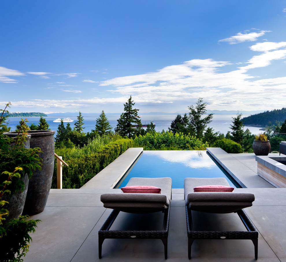 Inspiration for a contemporary patio in Vancouver with concrete slab and no cover.