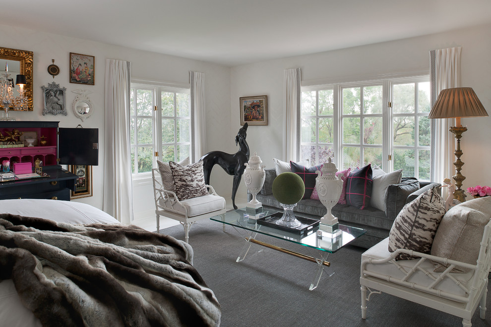 This is an example of a large eclectic bedroom in New York with grey walls, no fireplace and white floor.