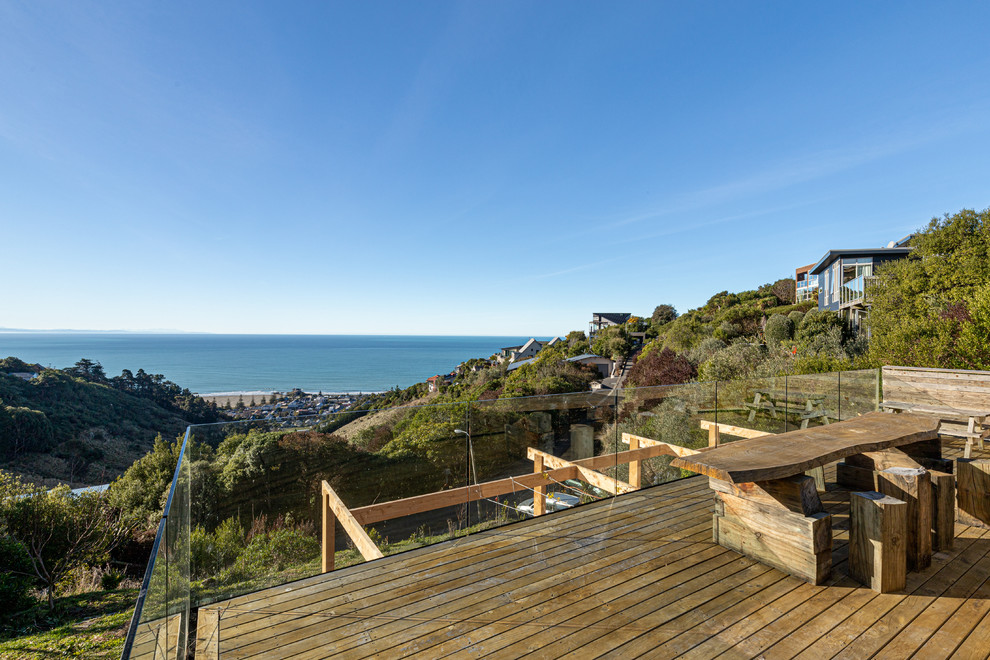 This is an example of a beach style rooftop and rooftop deck in Christchurch with no cover.