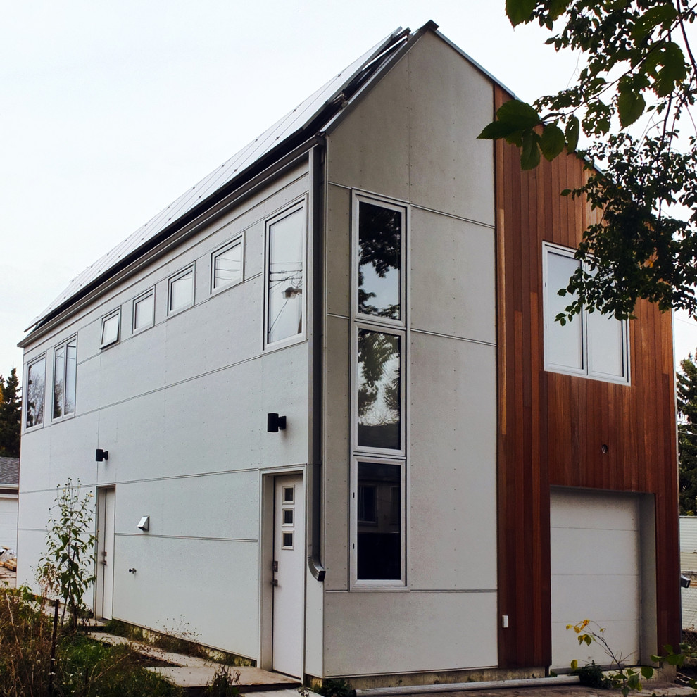 Garage workshop - small scandinavian detached two-car garage workshop idea in Calgary