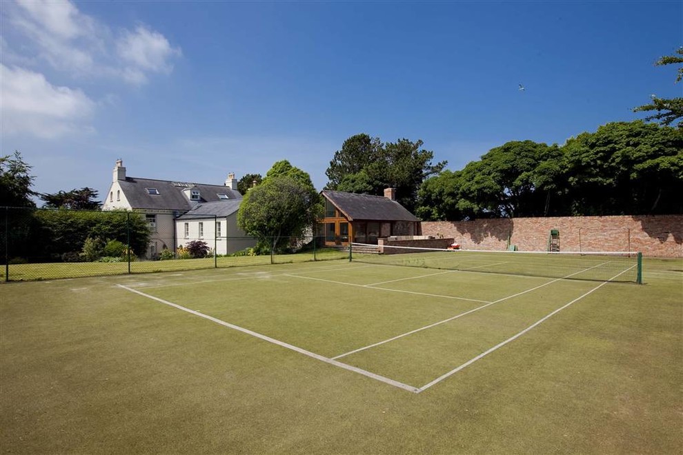 This is an example of a traditional backyard outdoor sport court in London.