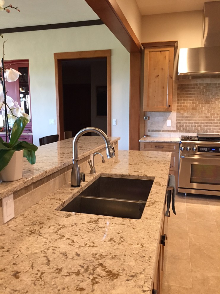 Large transitional ceramic tile kitchen photo with ceramic backsplash, a double-bowl sink, shaker cabinets, medium tone wood cabinets, beige backsplash and quartz countertops