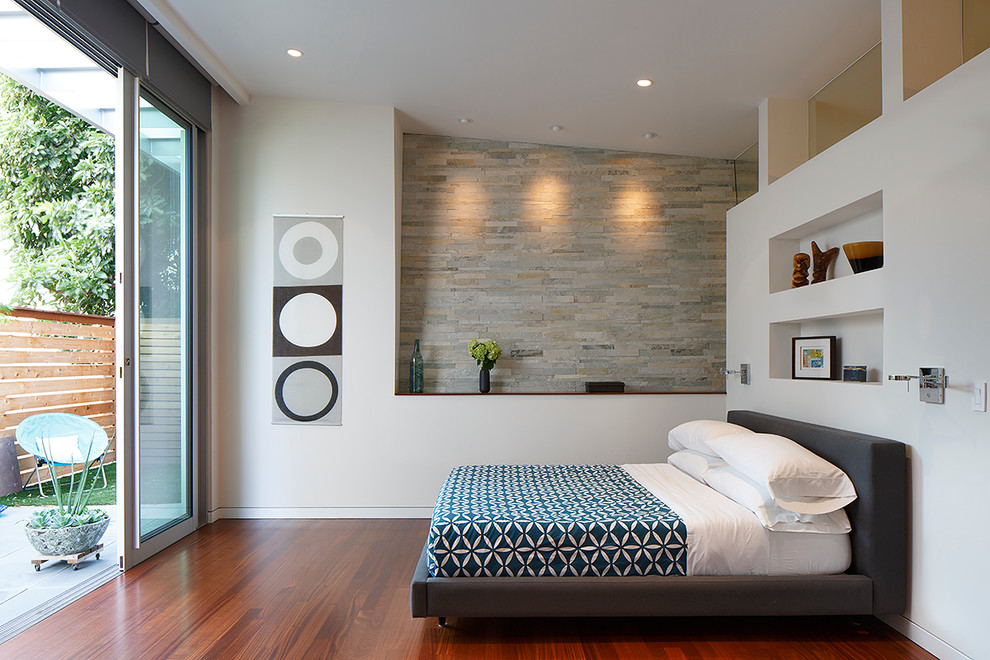 Inspiration for a contemporary bedroom in San Francisco with white walls.