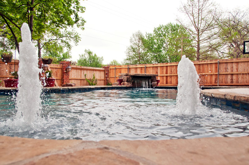 Inspiration for a transitional backyard concrete and custom-shaped home design remodel in Oklahoma City