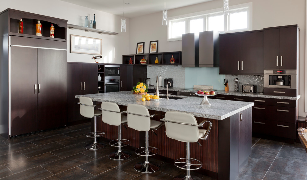 Inspiration for a contemporary galley kitchen in Toronto with flat-panel cabinets and dark wood cabinets.