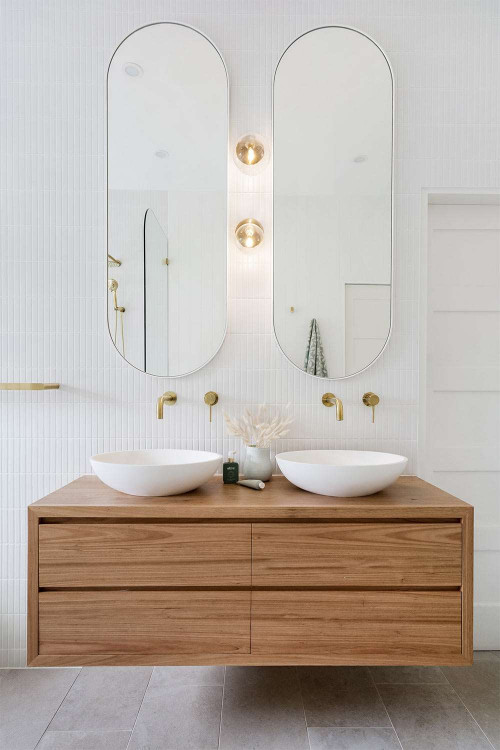 Modern Simplicity: Wood Floating Vanity and Gold Accents for Bathroom Vanity Lighting Fixtures