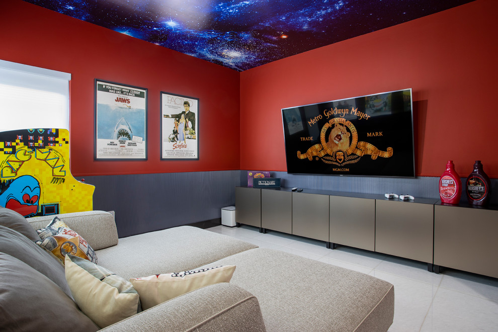 This is an example of a mid-sized modern enclosed home theatre in Miami with red walls, marble floors, a wall-mounted tv and white floor.