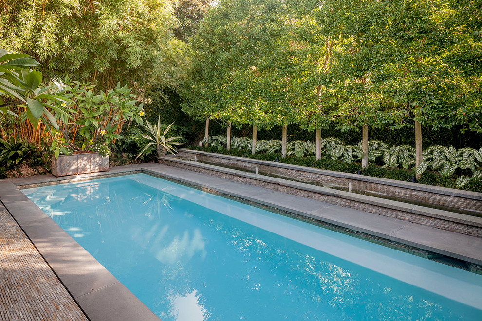 Contemporary backyard rectangular pool in New Orleans.