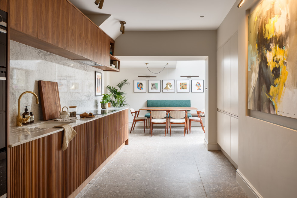 Inspiration for a mid-sized midcentury galley eat-in kitchen in Other with an integrated sink, flat-panel cabinets, dark wood cabinets, quartzite benchtops, grey splashback, engineered quartz splashback, panelled appliances, porcelain floors, no island, brown floor and grey benchtop.