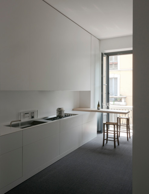 loft per un collezionista minimalistisch-kueche