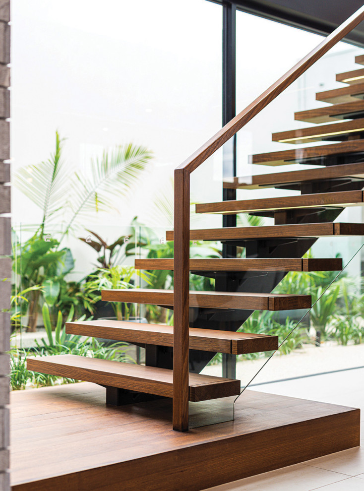 Inspiration for a medium sized contemporary wood straight wood railing staircase in Adelaide with open risers.