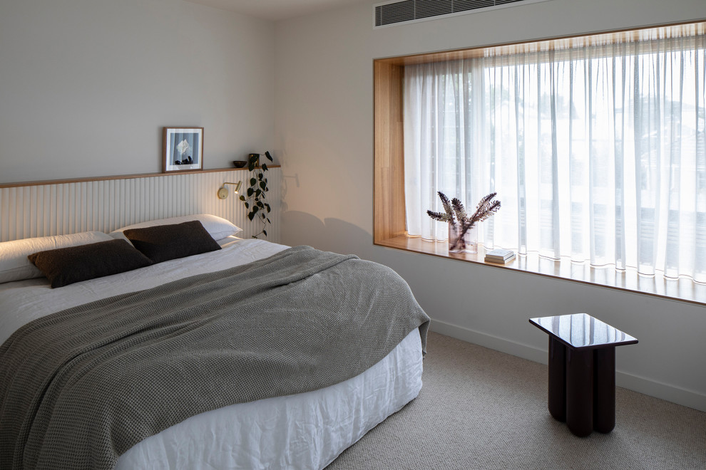 Photo of a scandinavian bedroom in Melbourne.