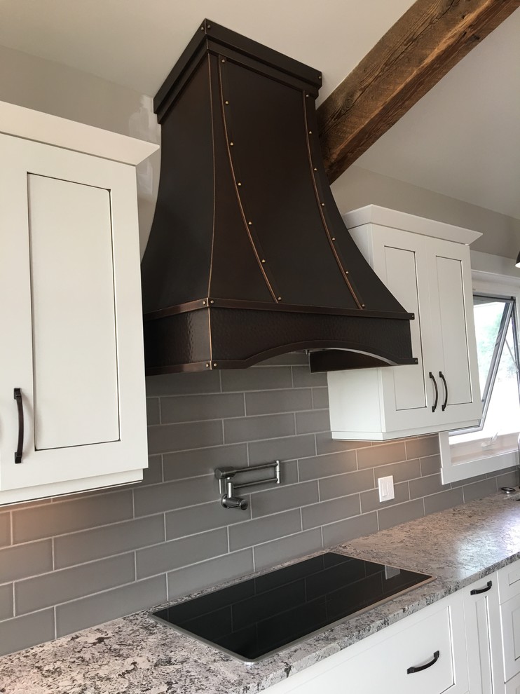 Example of a mountain style home design design in Edmonton
