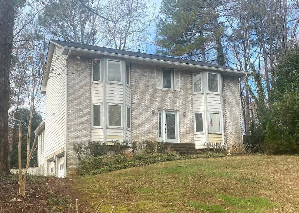 Painted Brick + Stacked Bay Windows + Siding = Design Dilemma