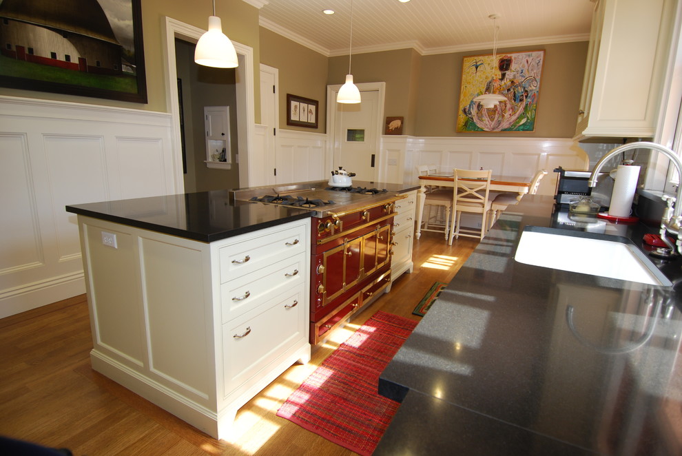 This is an example of a traditional kitchen in San Francisco with coloured appliances.