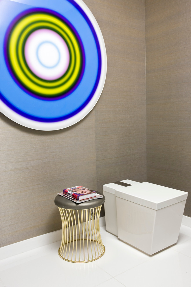Photo of a small contemporary 3/4 bathroom in Milwaukee with a one-piece toilet and limestone floors.