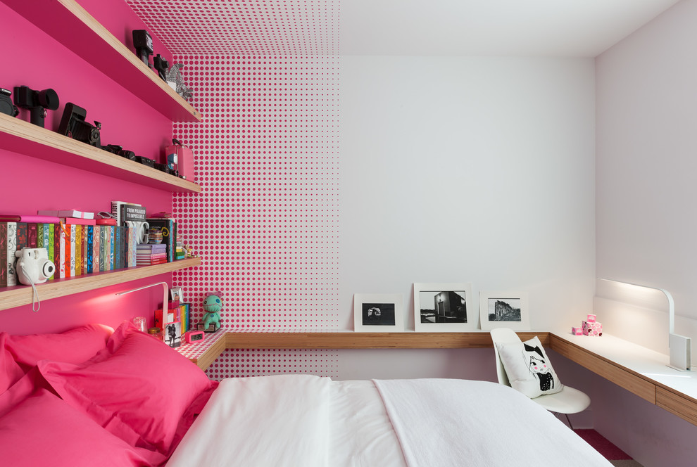 Inspiration for a contemporary kids' bedroom for girls in Omaha with pink walls.