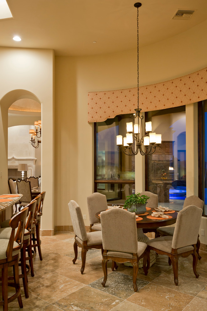 This is an example of a mediterranean dining room in Phoenix.