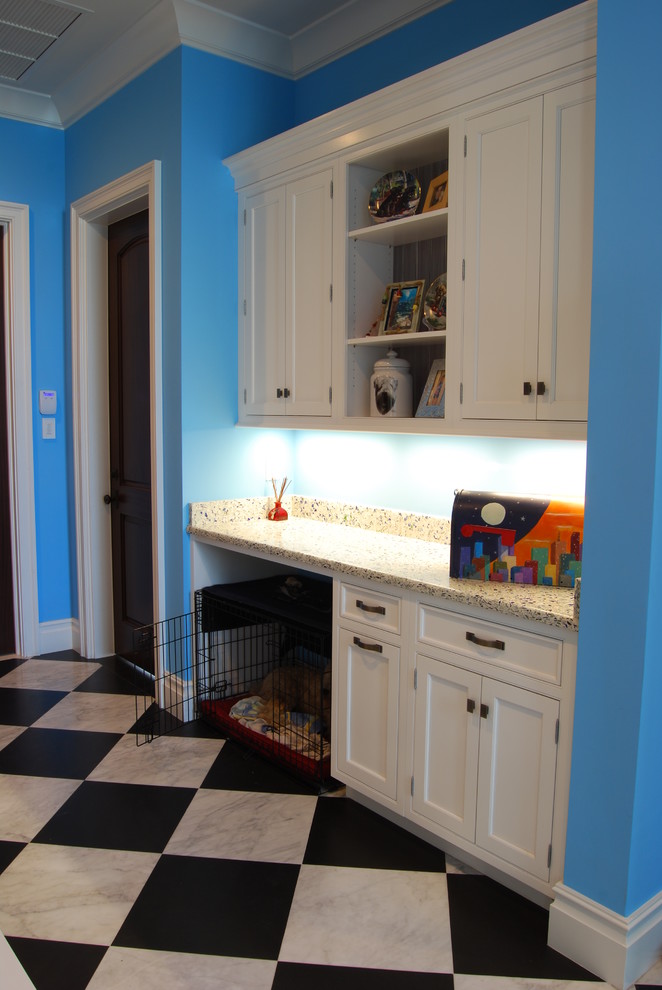 This is an example of a mid-sized beach style hallway in Cincinnati with blue walls and ceramic floors.
