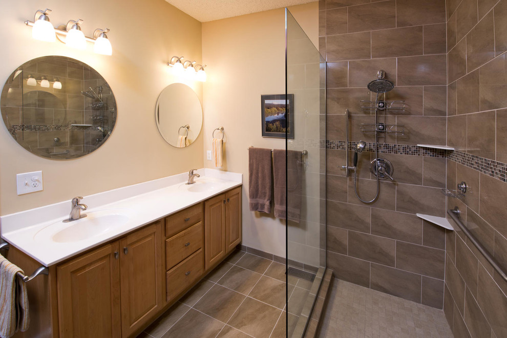 Photo of a mid-sized contemporary master bathroom in Minneapolis with raised-panel cabinets, medium wood cabinets, a corner shower, beige walls, porcelain floors, an integrated sink and an open shower.