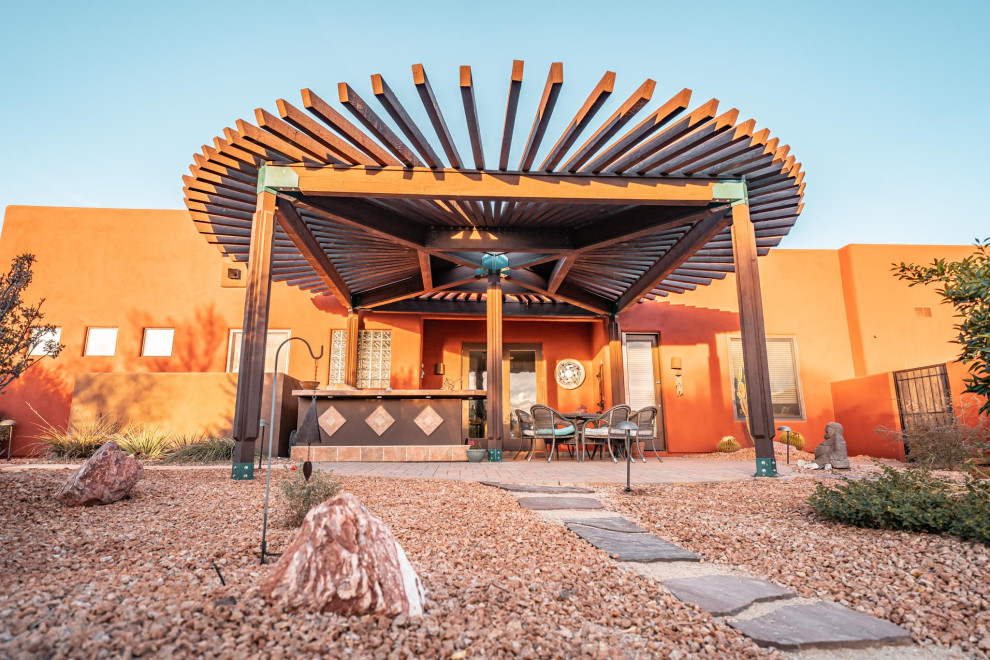 Inspiration for a rustic patio remodel in Phoenix