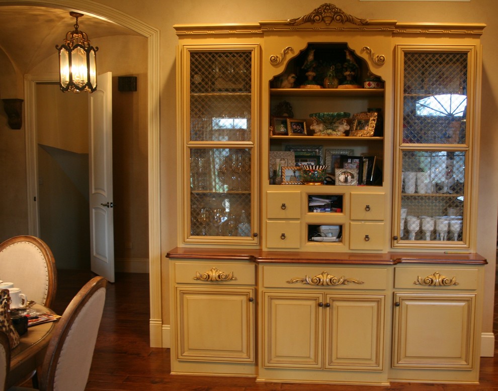 Inspiration for a traditional kitchen in Other with raised-panel cabinets, beige cabinets and wood benchtops.