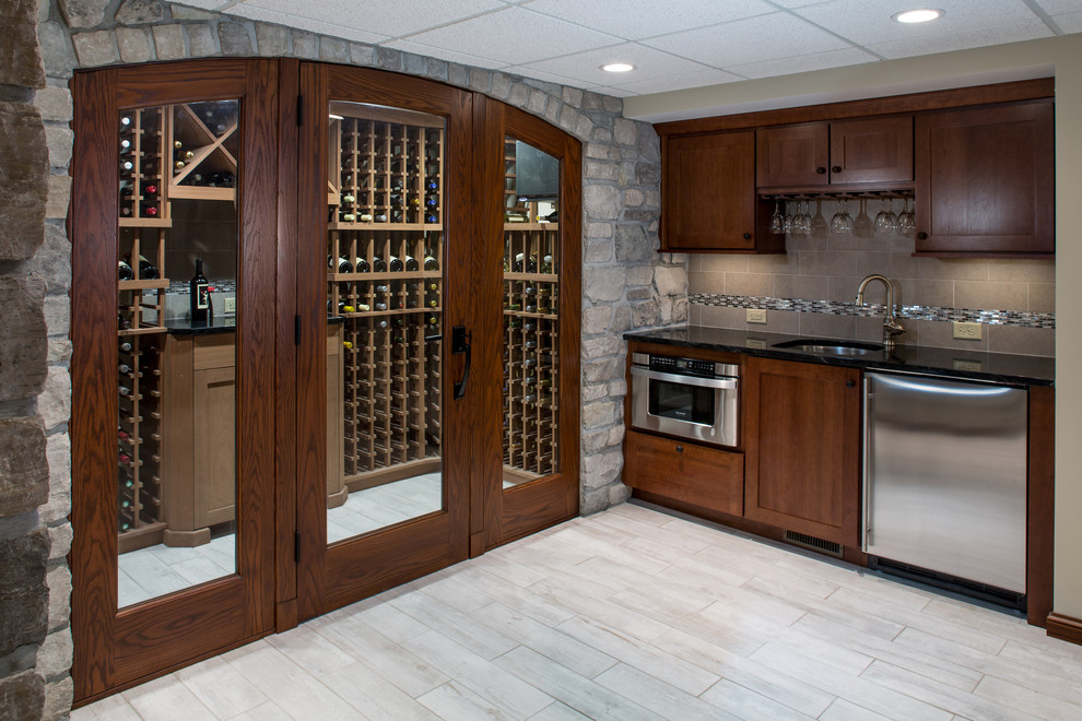 Large contemporary wine cellar in St Louis with ceramic floors.