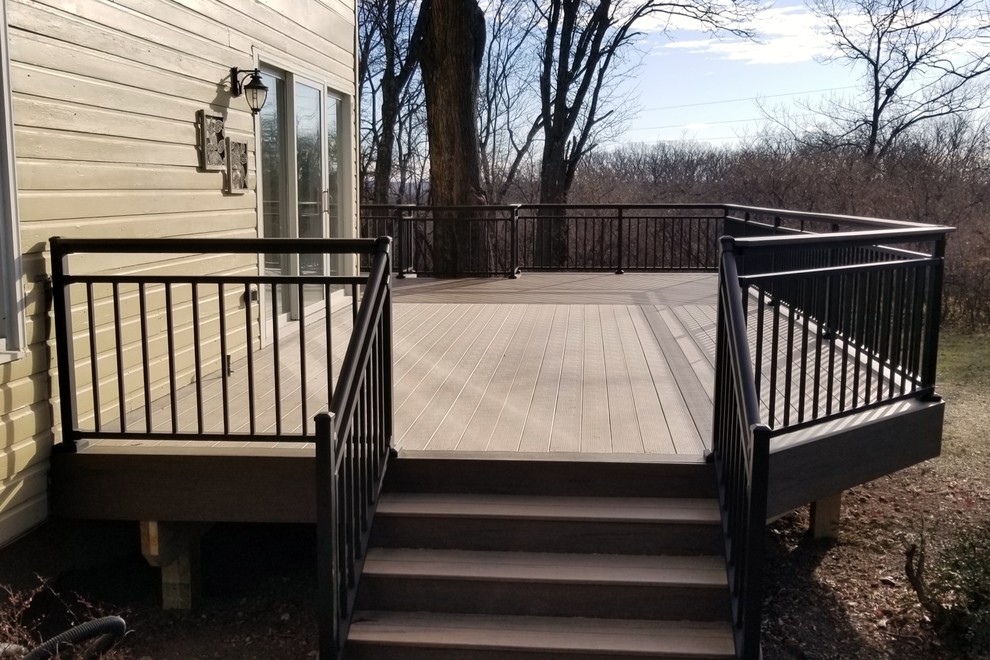 Inspiration for a large backyard deck remodel with no cover