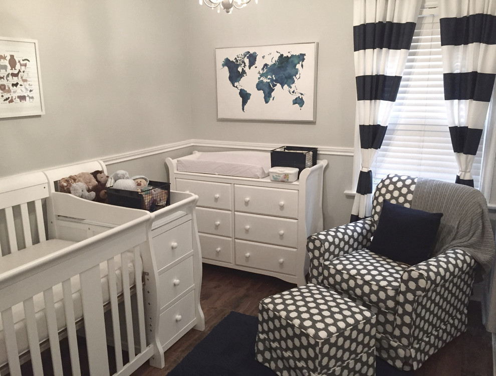 Design ideas for a mid-sized transitional gender-neutral nursery in Toronto with grey walls and dark hardwood floors.