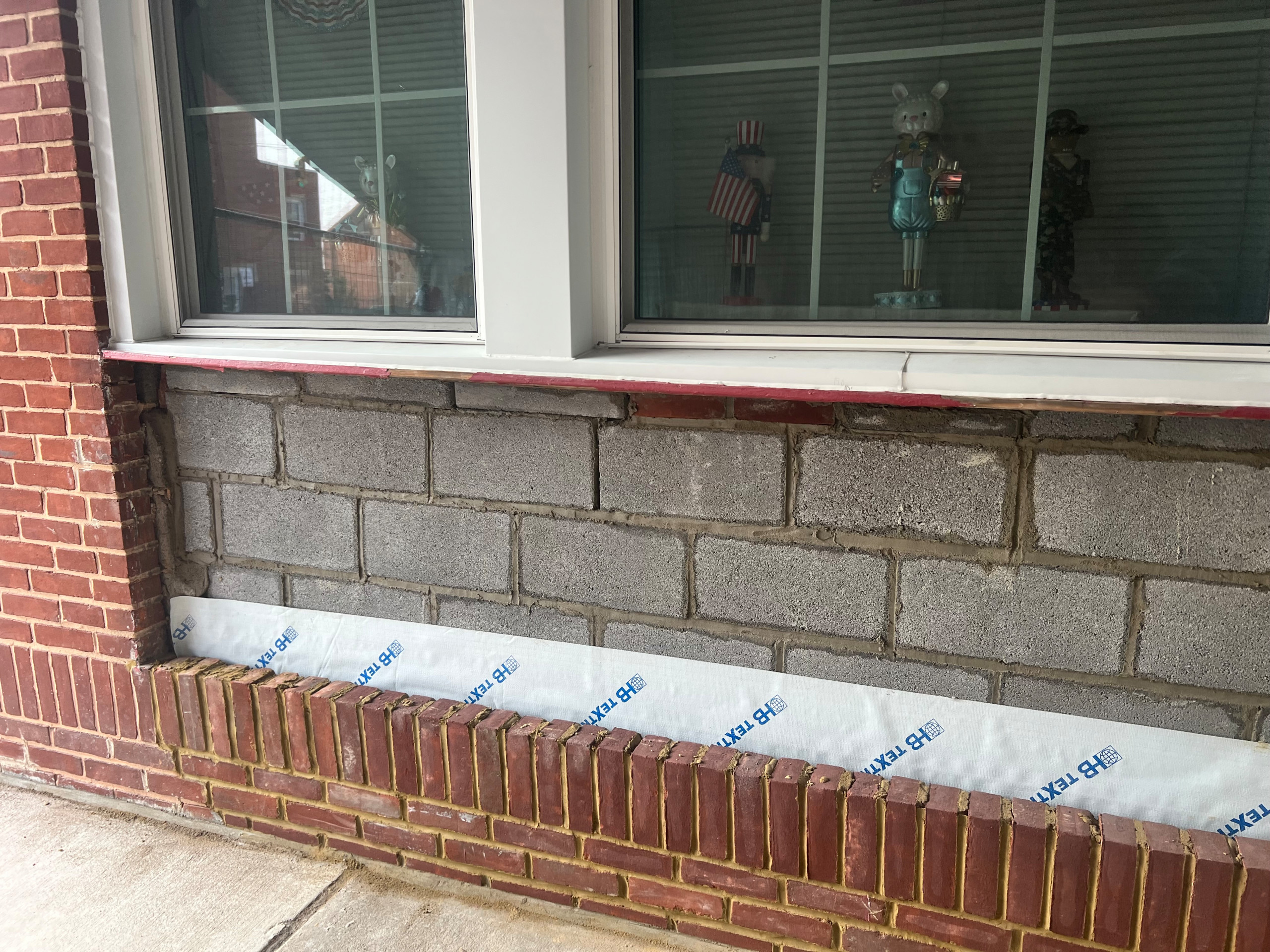 Historic wall panel and brick veneer replacement