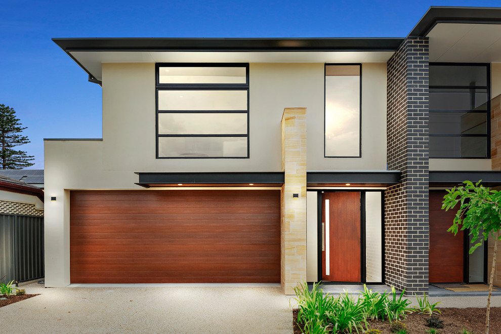 Photo of a contemporary two-storey multi-coloured house exterior in Adelaide with a flat roof.