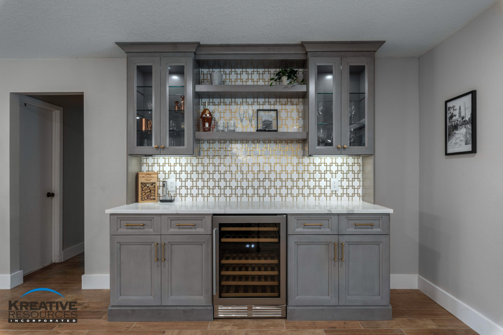 Example of a large transitional single-wall porcelain tile and brown floor eat-in kitchen design in Orlando with an undermount sink, shaker cabinets, gray cabinets, quartzite countertops, beige backsplash, porcelain backsplash, stainless steel appliances, no island and white countertops