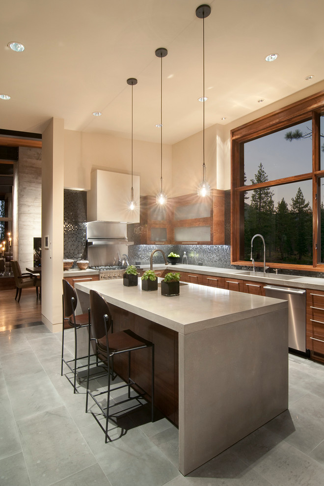 Contemporary kitchen in Sacramento with flat-panel cabinets, dark wood cabinets, black splashback, mosaic tile splashback, stainless steel appliances, concrete benchtops and an integrated sink.