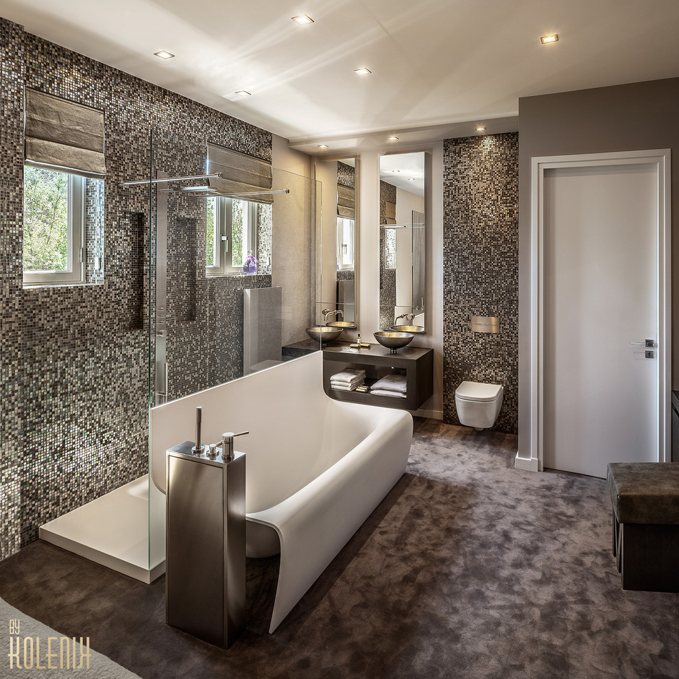 Photo of a contemporary bathroom in Amsterdam with a vessel sink, a freestanding tub, an open shower, a wall-mount toilet, open cabinets, dark wood cabinets, wood benchtops and mosaic tile.