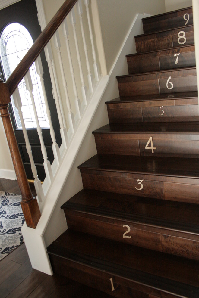 Elegant wooden wood railing staircase photo in Other