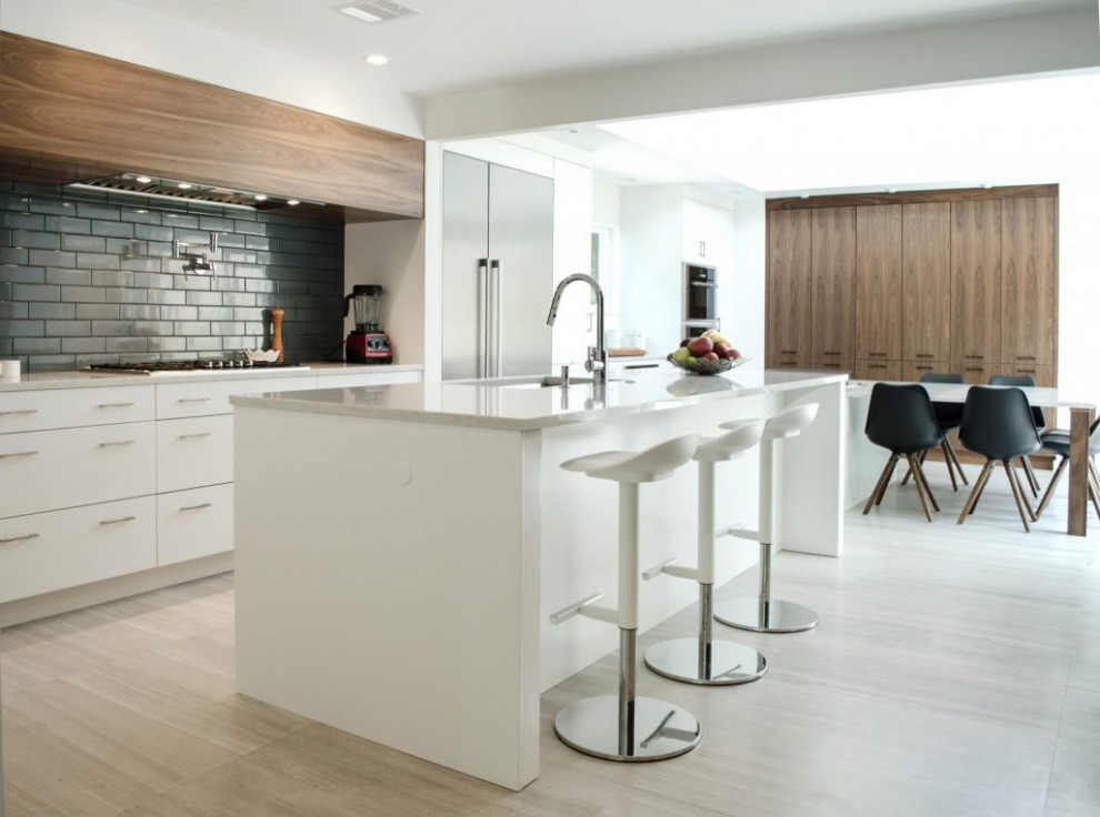 Design ideas for a large modern galley eat-in kitchen in Other with a single-bowl sink, flat-panel cabinets, white cabinets, quartz benchtops, grey splashback, ceramic splashback, stainless steel appliances, marble floors, multiple islands, grey floor, white benchtop and recessed.