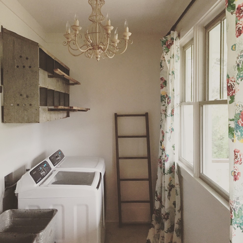 Inspiration for a mid-sized country galley dedicated laundry room in Atlanta with a double-bowl sink, open cabinets, white walls, ceramic floors and a side-by-side washer and dryer.