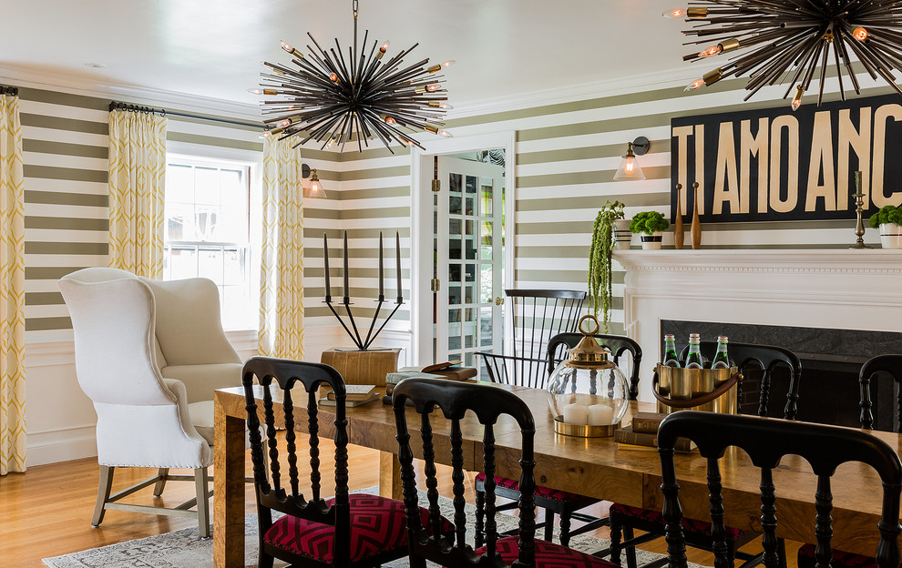 This is an example of an eclectic separate dining room in Boston with medium hardwood floors.